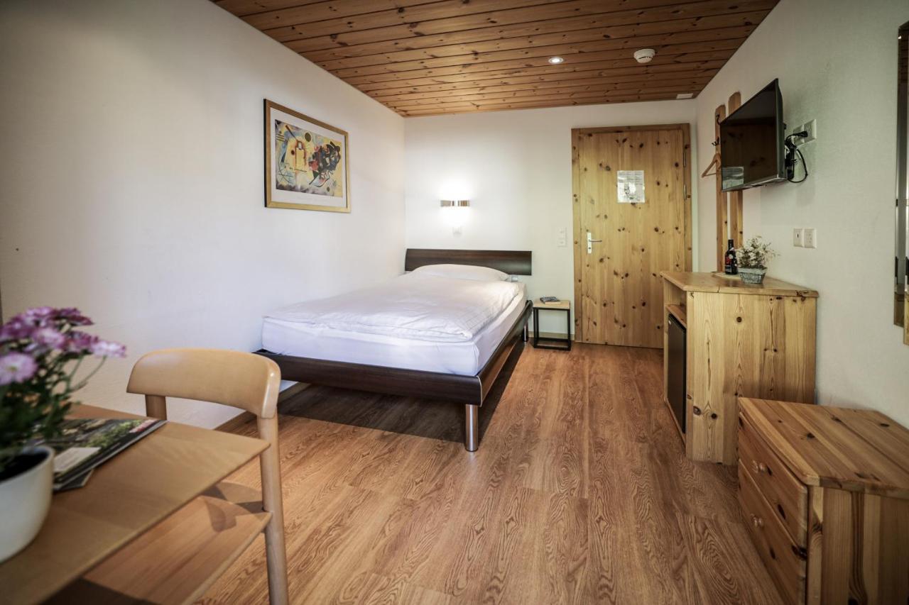 Hotel Garni Sonnenhalde Arosa Buitenkant foto