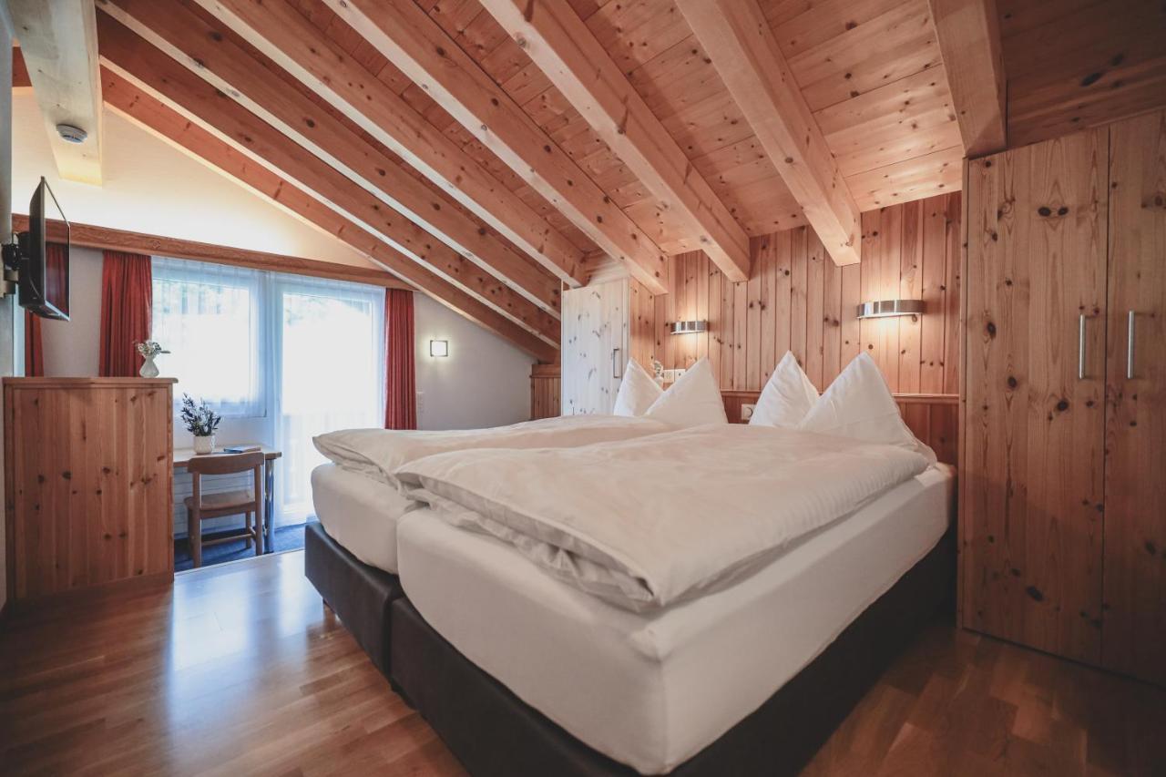 Hotel Garni Sonnenhalde Arosa Buitenkant foto